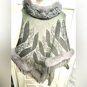 Grey Cape with faux fur.